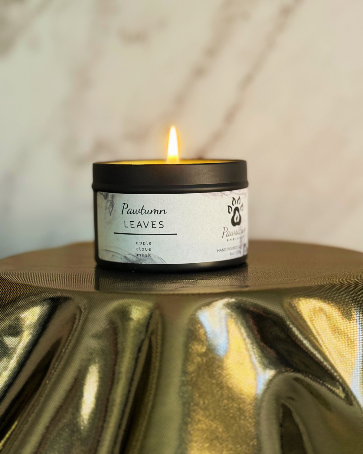 Hand-poured soy candle labeled Wine & Whiskers featuring notes of apple, clove, musk. 6 oz. Manufactured by Pawsitive Ambiance.