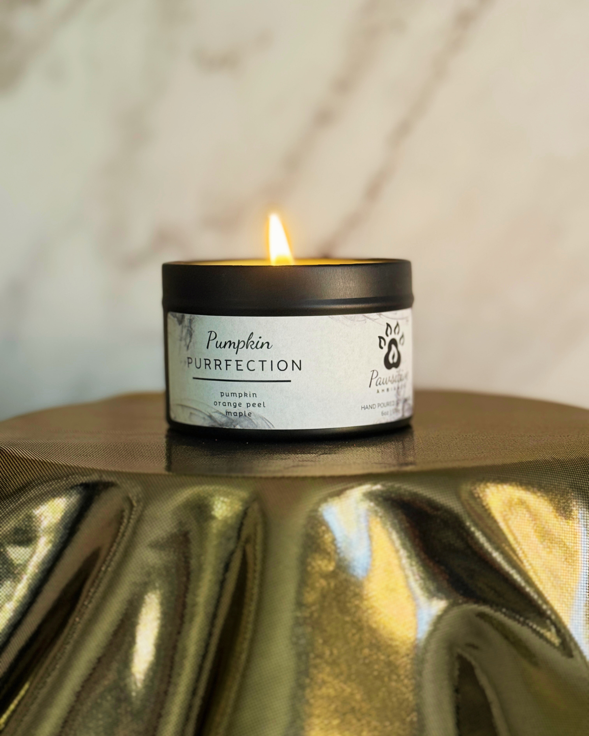 Hand-poured soy candle labeled Wine & Whiskers featuring notes of pumpkin, orange peel and maple. 6 oz. Manufactured by Pawsitive Ambiance.