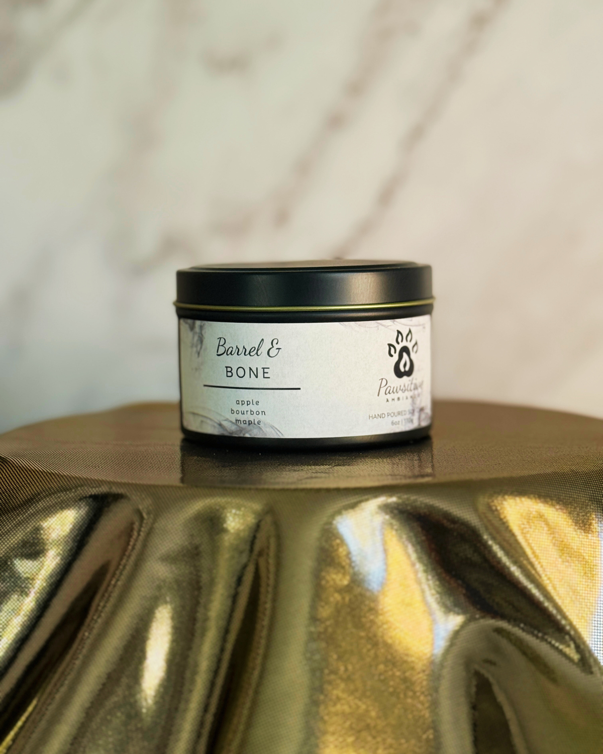 Hand-poured soy candle labeled Wine & Whiskers featuring notes of apple, bourbon and maple.  6 oz. Manufactured by Pawsitive Ambiance.