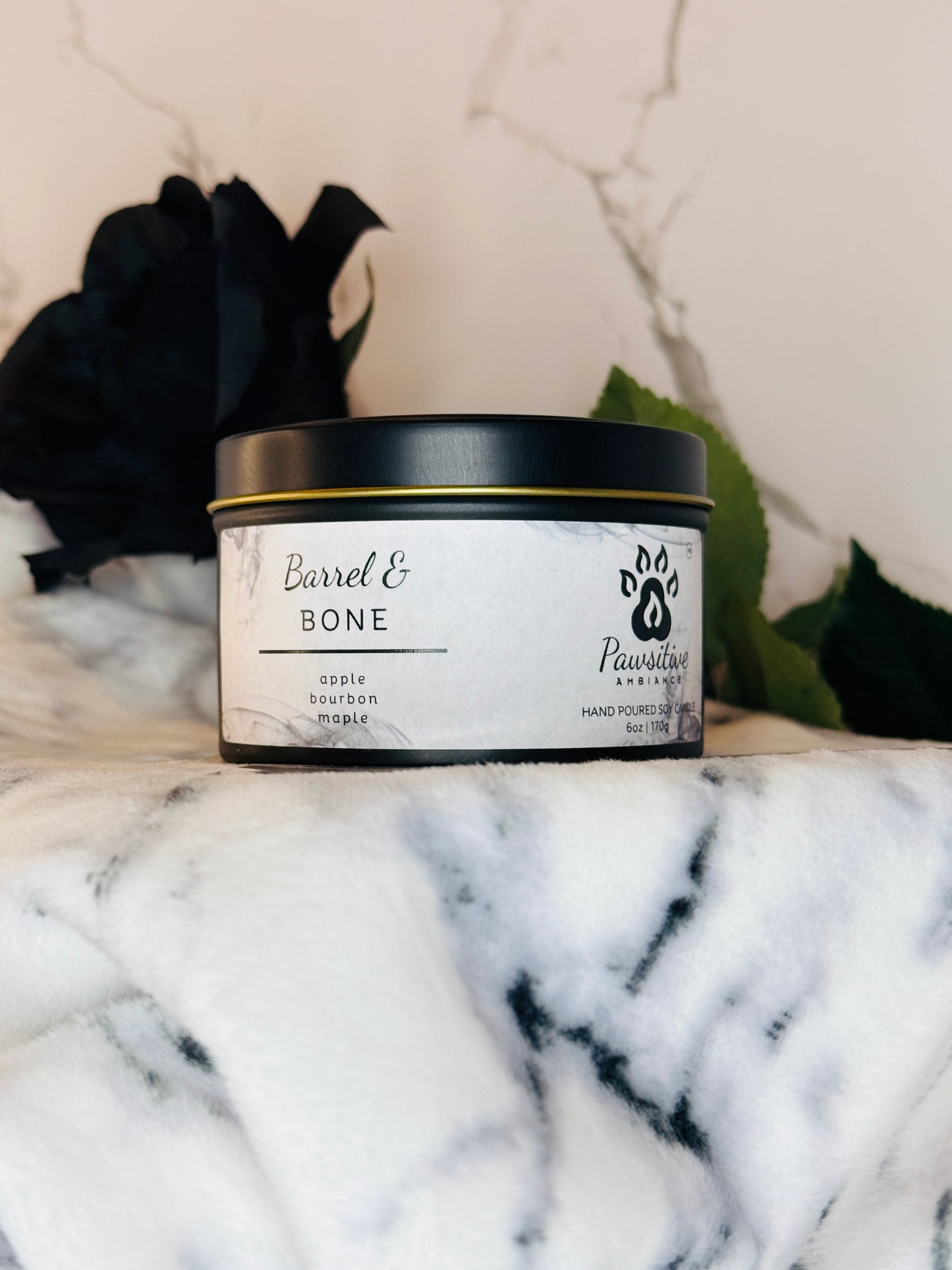 Hand-poured soy candle labeled Wine & Whiskers featuring notes of apple, bourbon and maple.  6 oz. Manufactured by Pawsitive Ambiance.