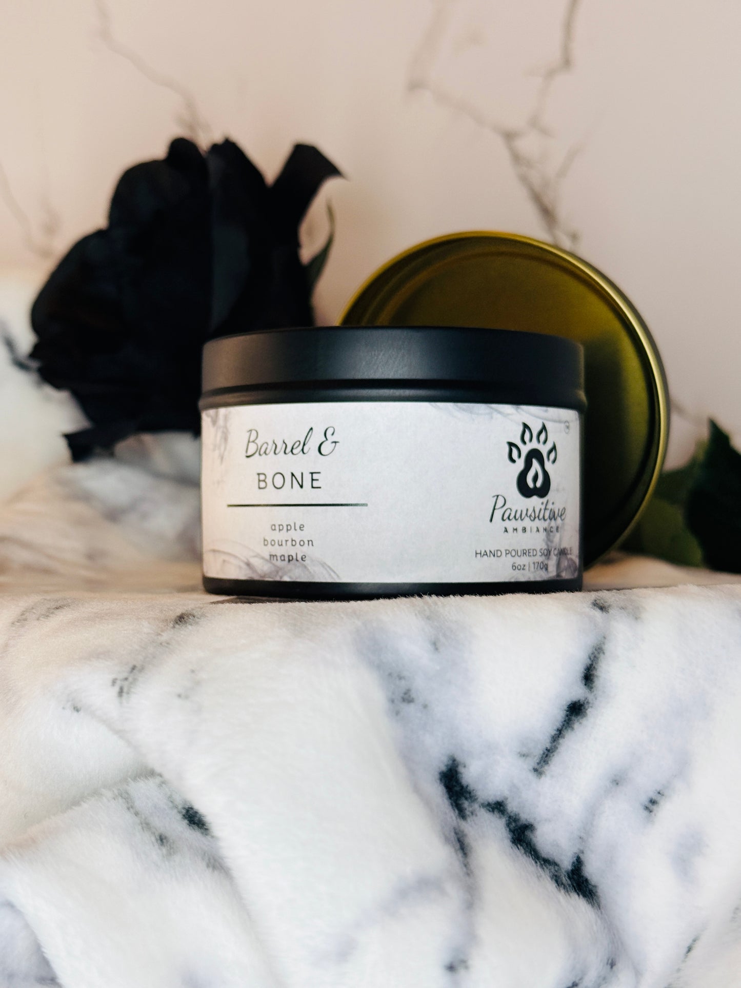 Hand-poured soy candle labeled Wine & Whiskers featuring notes of apple, bourbon and maple.  6 oz. Manufactured by Pawsitive Ambiance.