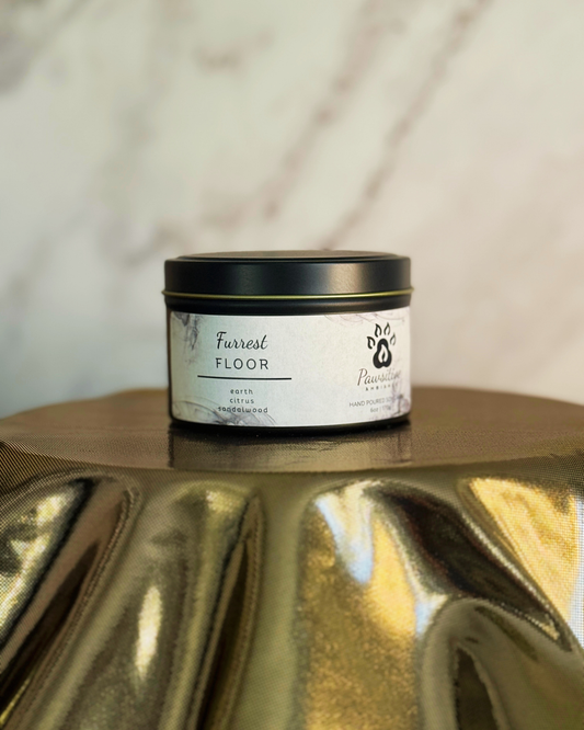 Hand-poured soy candle labeled Wine & Whiskers featuring notes of earth, citrus and sandalwood.  6 oz. Manufactured by Pawsitive Ambiance.