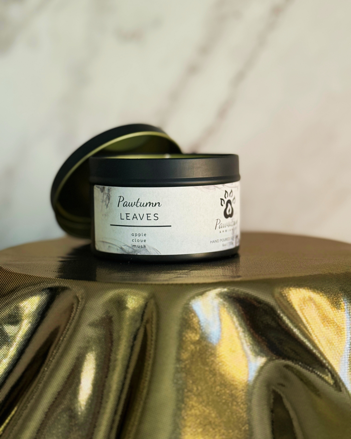 Hand-poured soy candle labeled Wine & Whiskers featuring notes of apple, clove, musk.  6 oz. Manufactured by Pawsitive Ambiance.