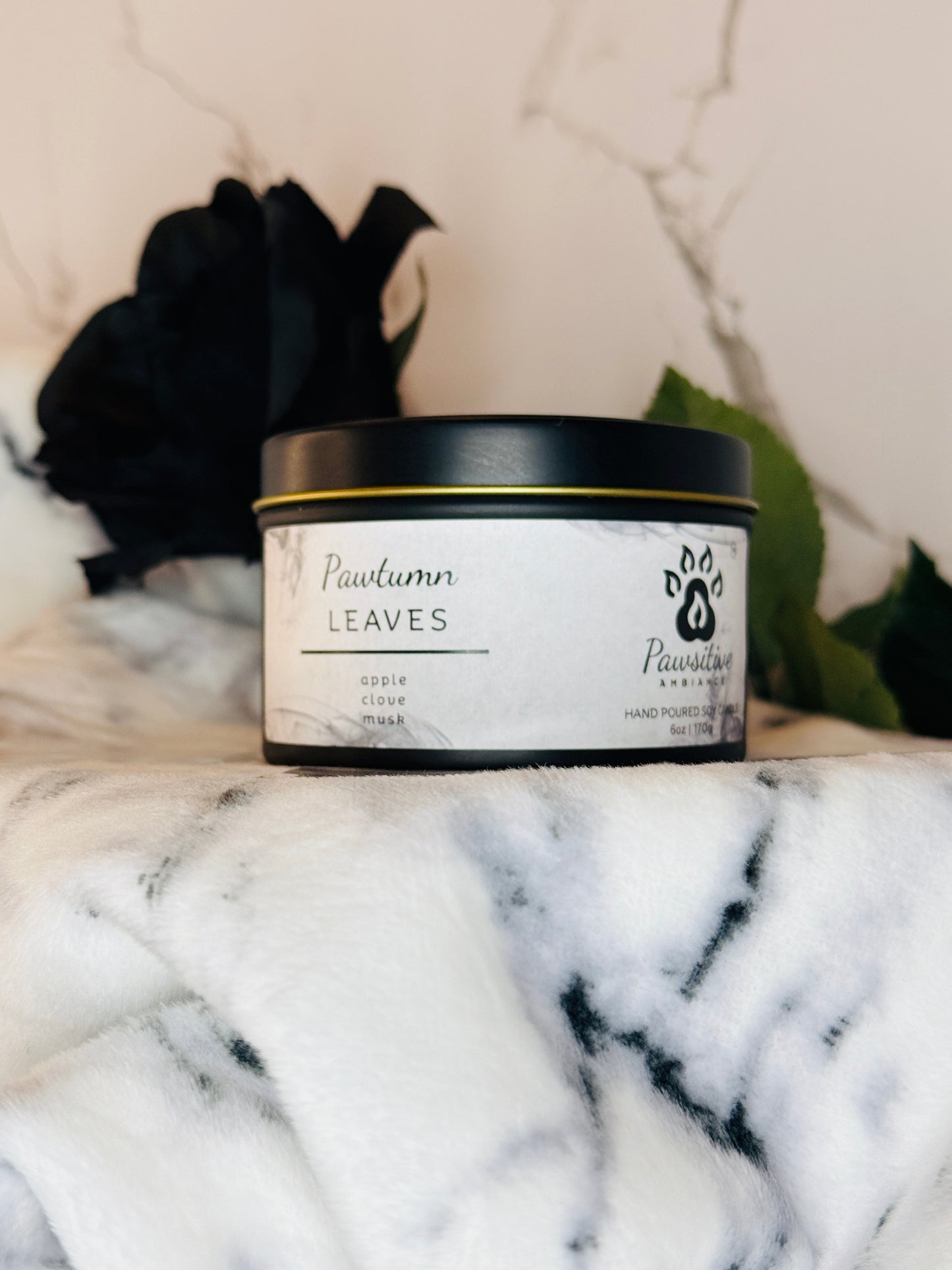 Hand-poured soy candle labeled Pawtumn Leaves featuring notes of apple, clove, musk.  6 oz. Manufactured by Pawsitive Ambiance.