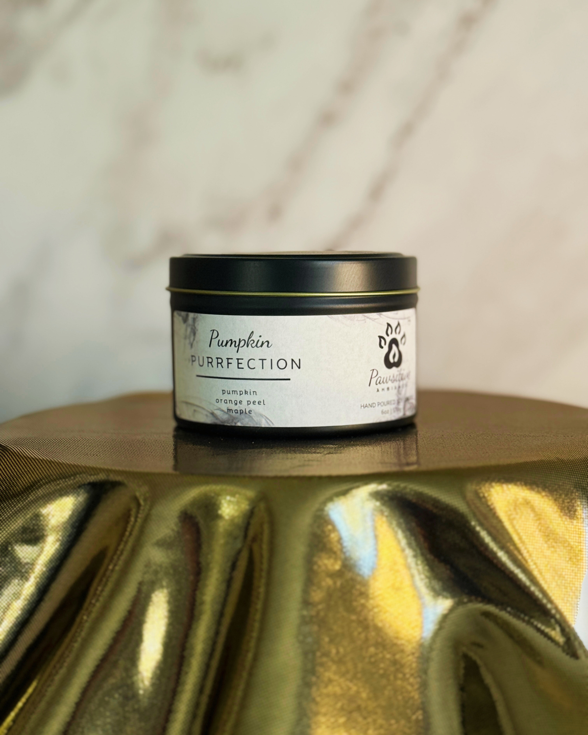 Hand-poured soy candle labeled Wine & Whiskers featuring notes of pumpkin, orange peel and maple.  6 oz. Manufactured by Pawsitive Ambiance.