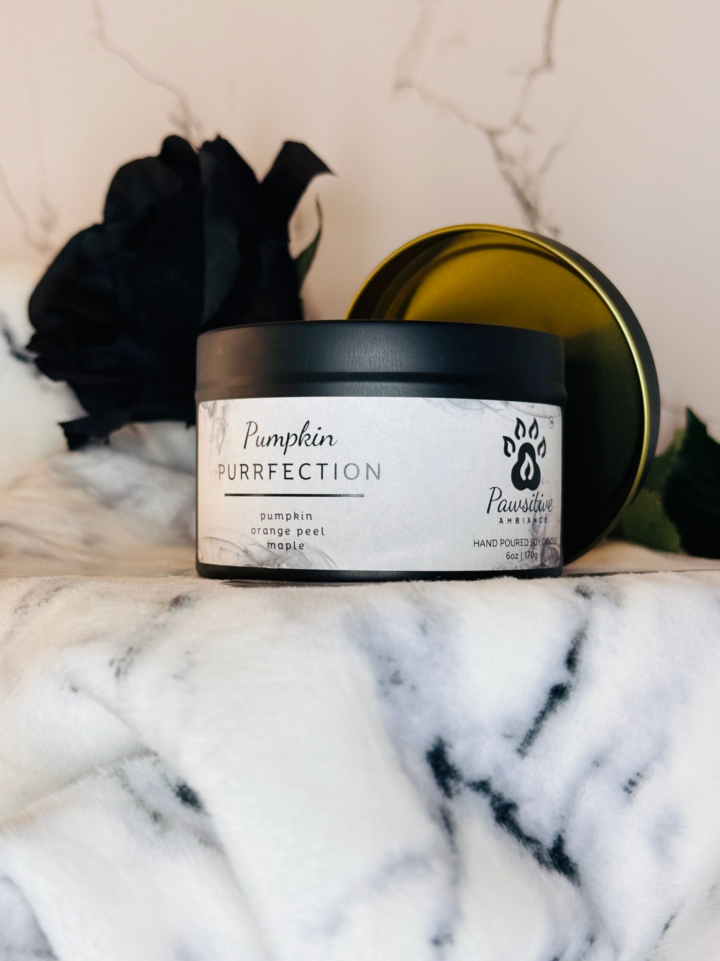 Hand-poured soy candle labeled Pumpkin Purrfection featuring notes of pumpkin, orange peel and maple.  6 oz. Manufactured by Pawsitive Ambiance.